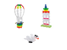 All four builds together: the pastel hot air balloon, rainbow, swan and small figure