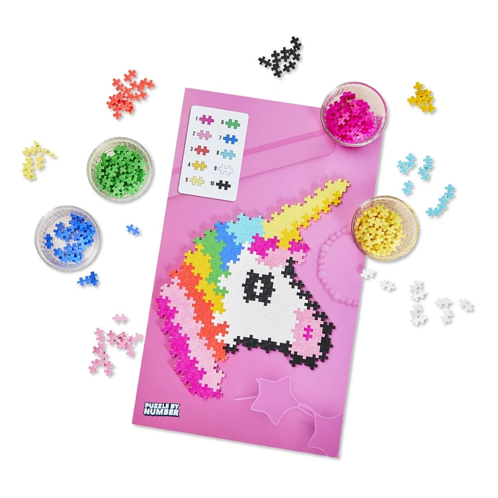 Completed 250-piece Plus-Plus unicorn mosaic in pastel pink, coral and fuchsia shades