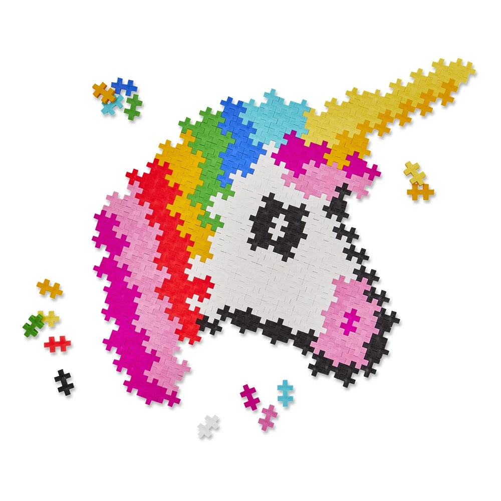 The 1:1 numbered unicorn stencil laid flat before any Plus-Plus pieces are placed on it