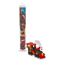 Plus-Plus Train 100 piece building tube standing upright against a plain white background