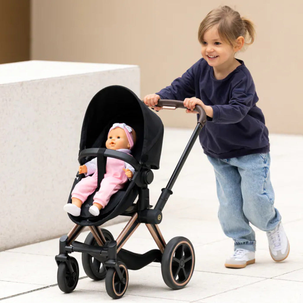 42cm Corolle baby doll sitting up in the Corolle x Cybex doll pram in buggy mode
