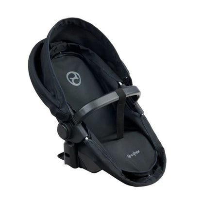 Corolle x Cybex doll pram folded down for compact storage after playtime is over