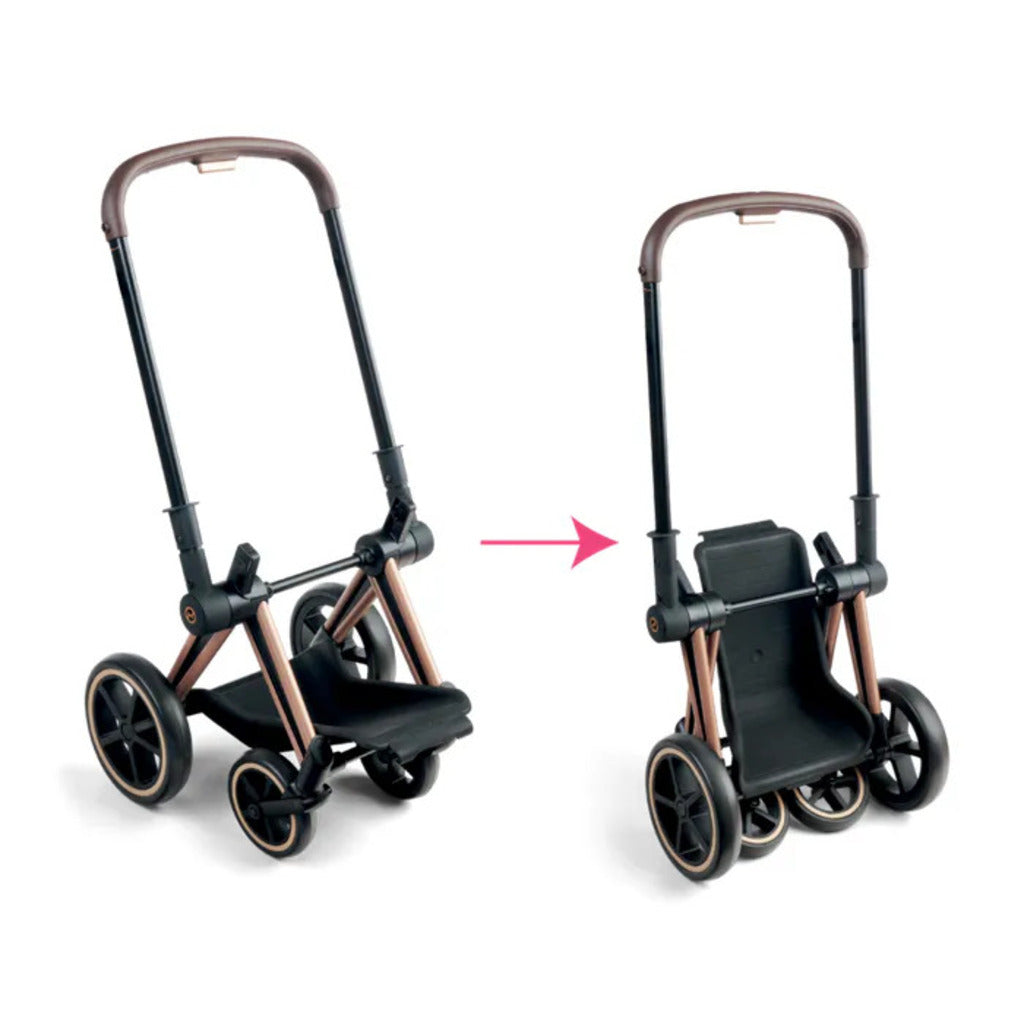 Detail of the handlebar on the Corolle x Cybex doll pram, set at 64.5cm to suit a child's height