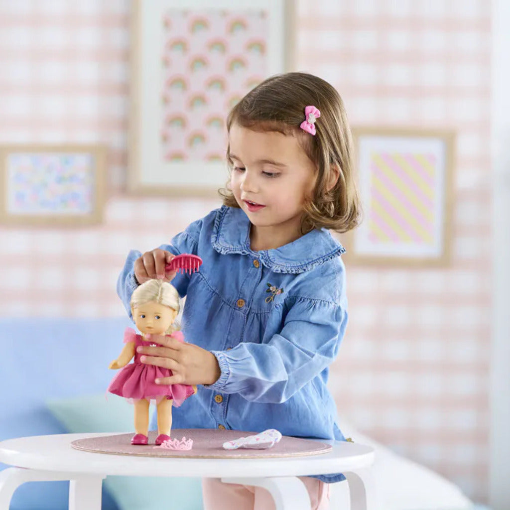 Rosy the Mini Corolline doll in her fairy outfit, posed for imaginative fairy play