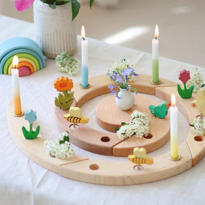 Grimm's rainbow celebration candles displayed in a Celebration Ring