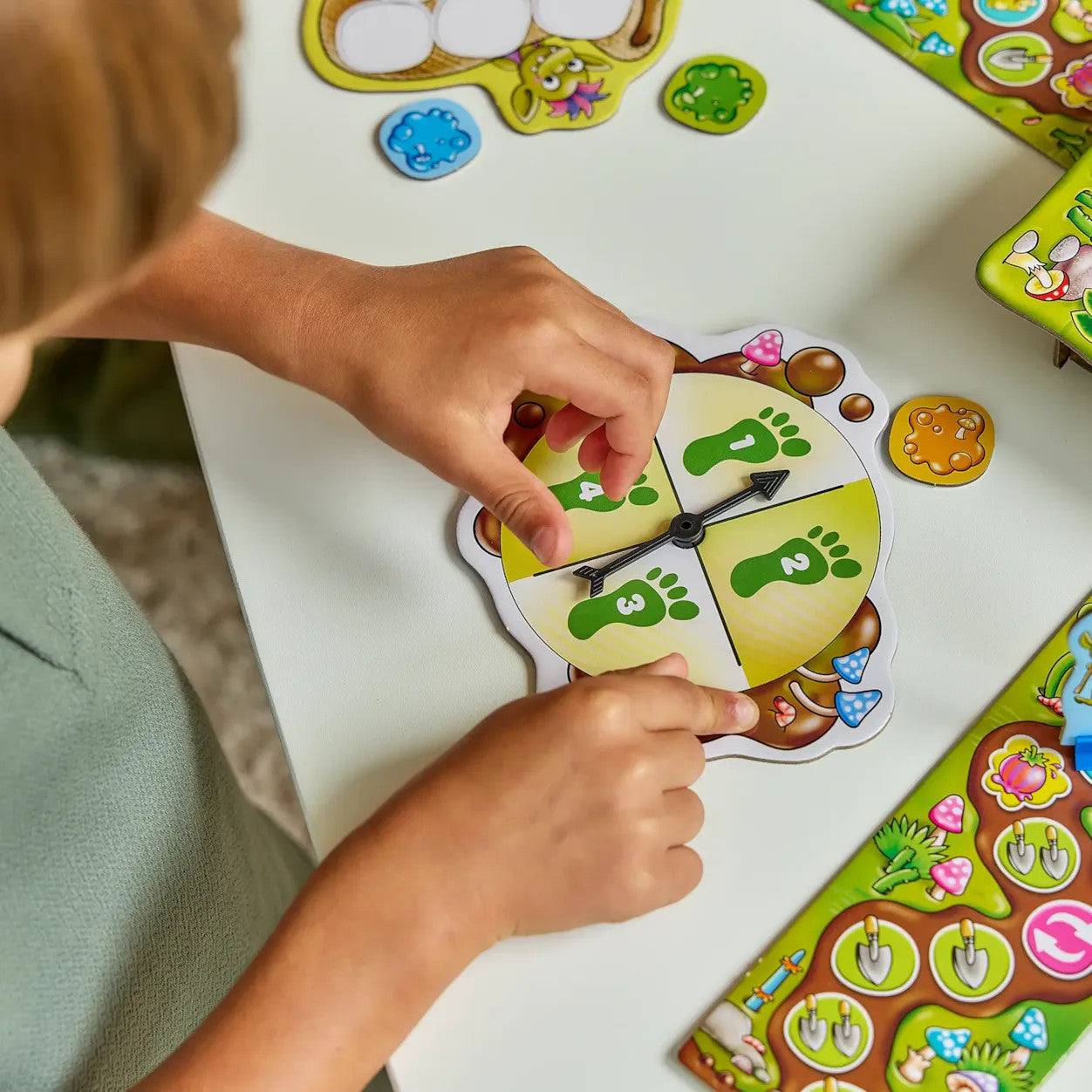 Orchard Toys Troll in a Hole double-sided board game featuring colourful trolls, mushrooms and fun educational gameplay for kids.