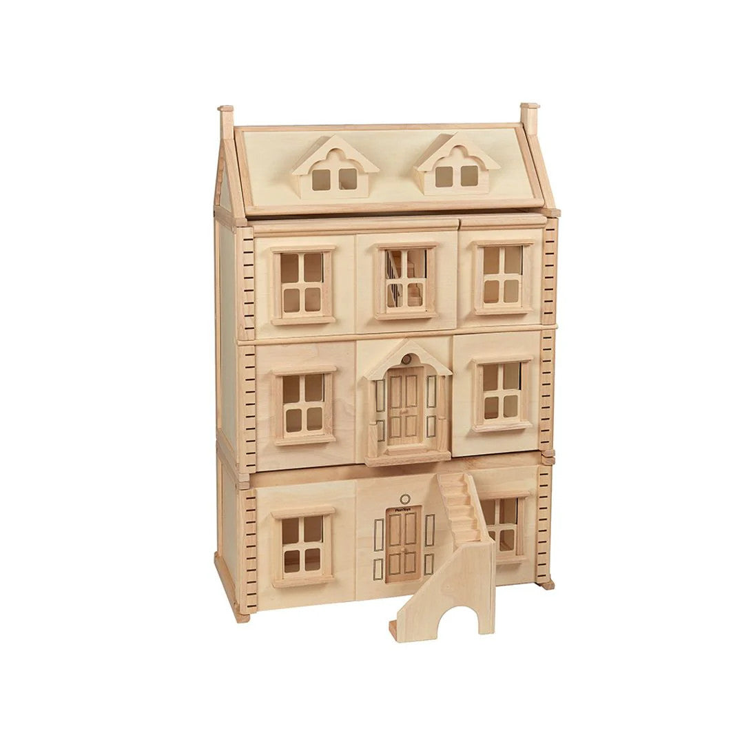 PlanToys wooden dollhouse basement extension with staircase, windows and natural wood finish for imaginative pretend play.