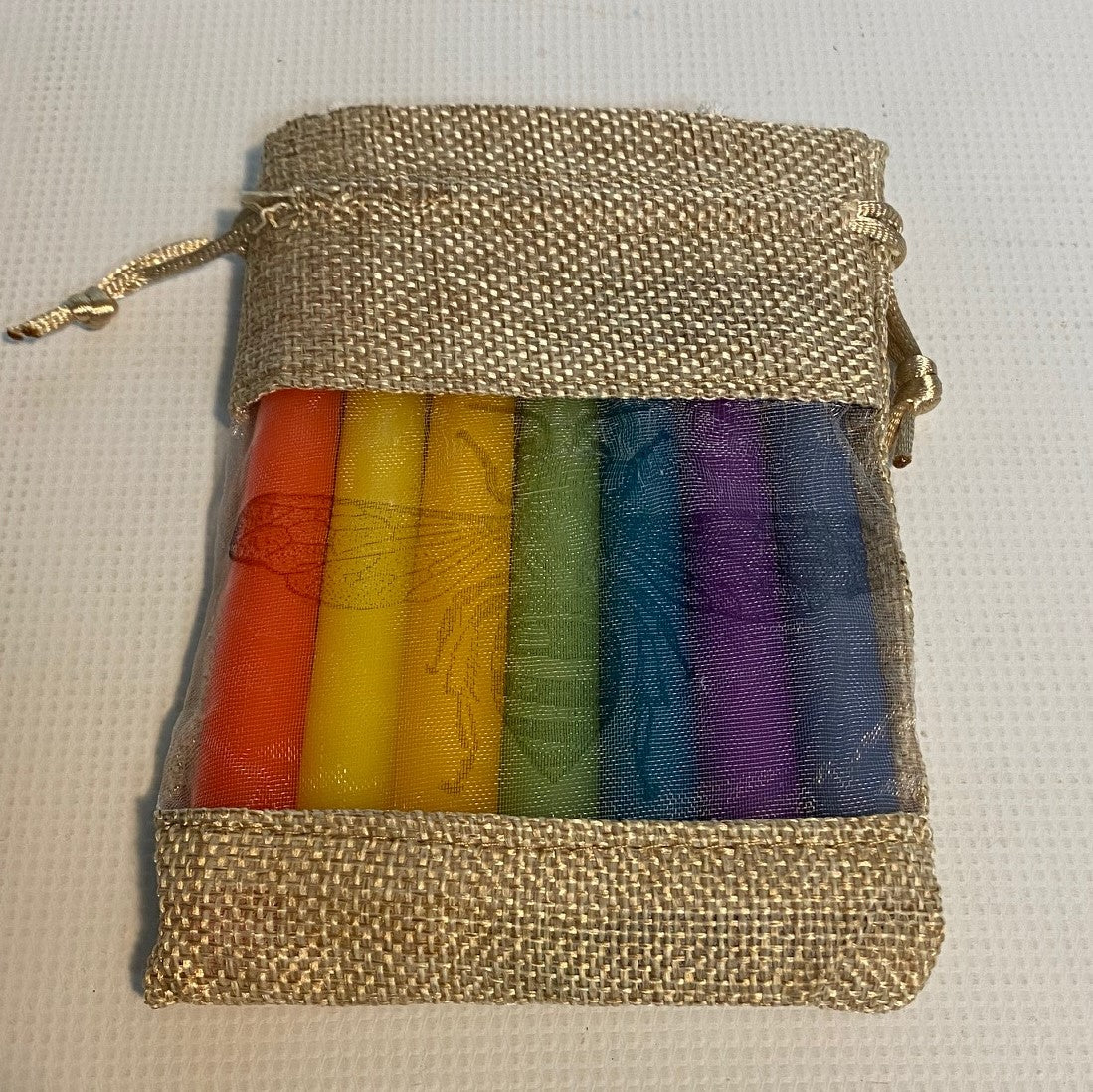 Seven pure beeswax rainbow candles for Waldorf Celebration Rings in hessian pouch
