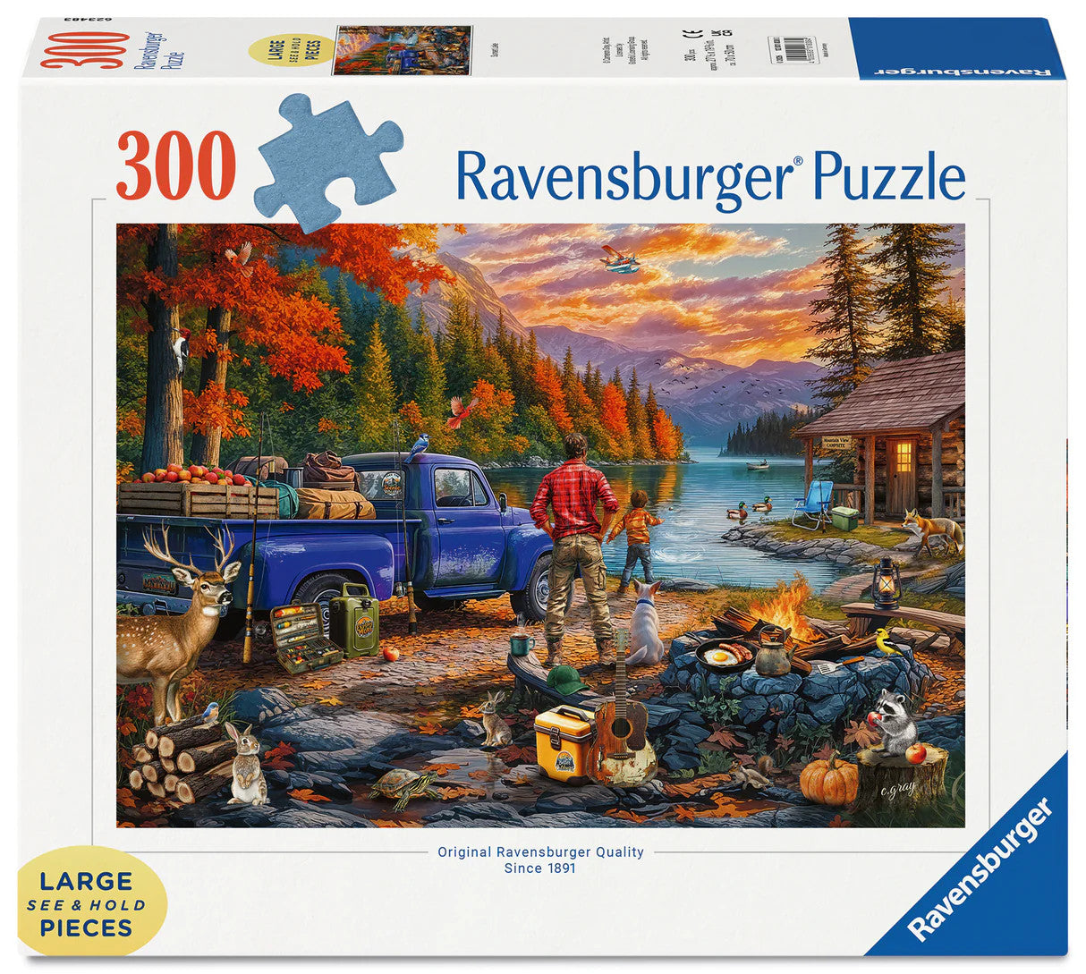 Ravensburger Sunset Lake Large Format 300 piece puzzle featuring lakeside camping scene, wildlife, mountains and sunset landscape